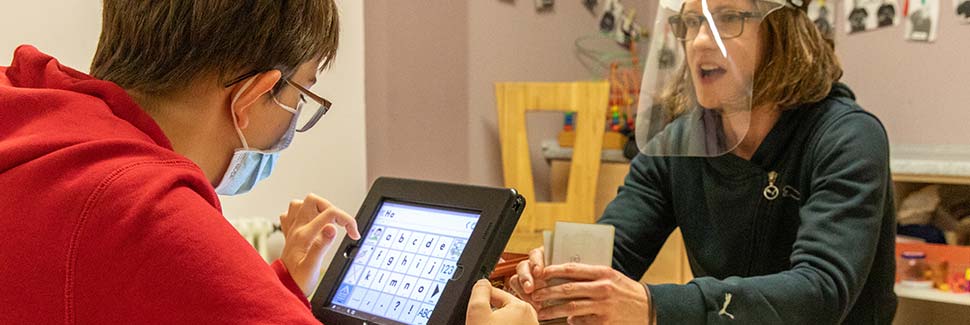 Kind am Tablet - Heilpädagogische Tagesstätte